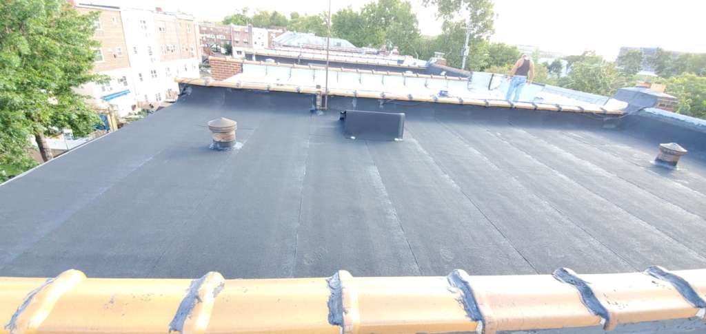 Installed a New Layer Over the Existing Flat Roof Project Shot 2