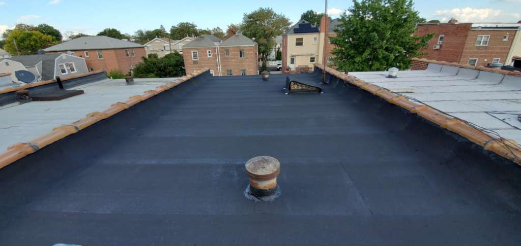 Installed a New Layer Over the Existing Flat Roof Project Shot 6