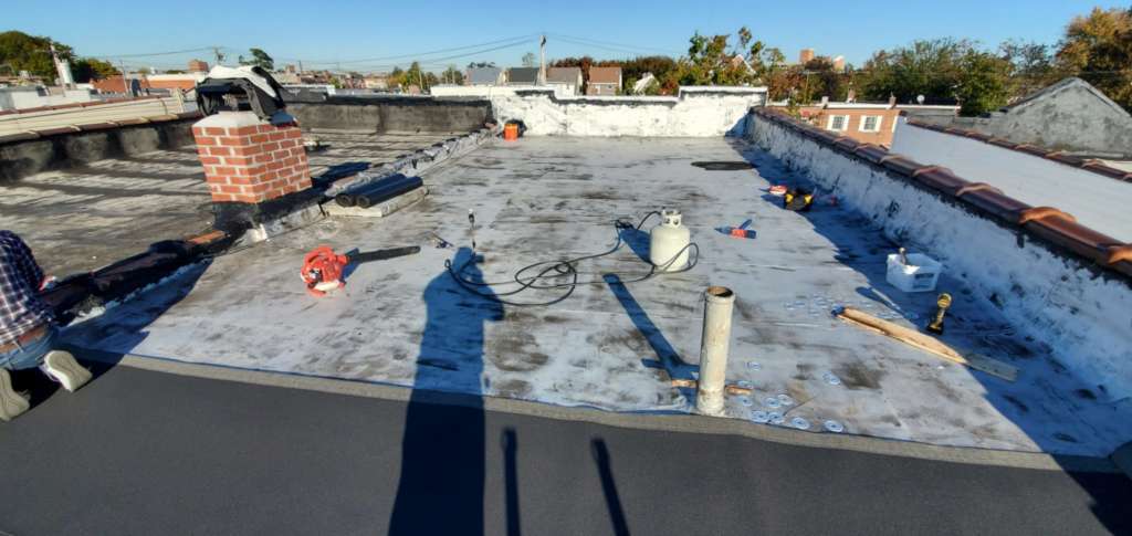 New Layer Installation Over Existing Flat Roof Project Shot 2