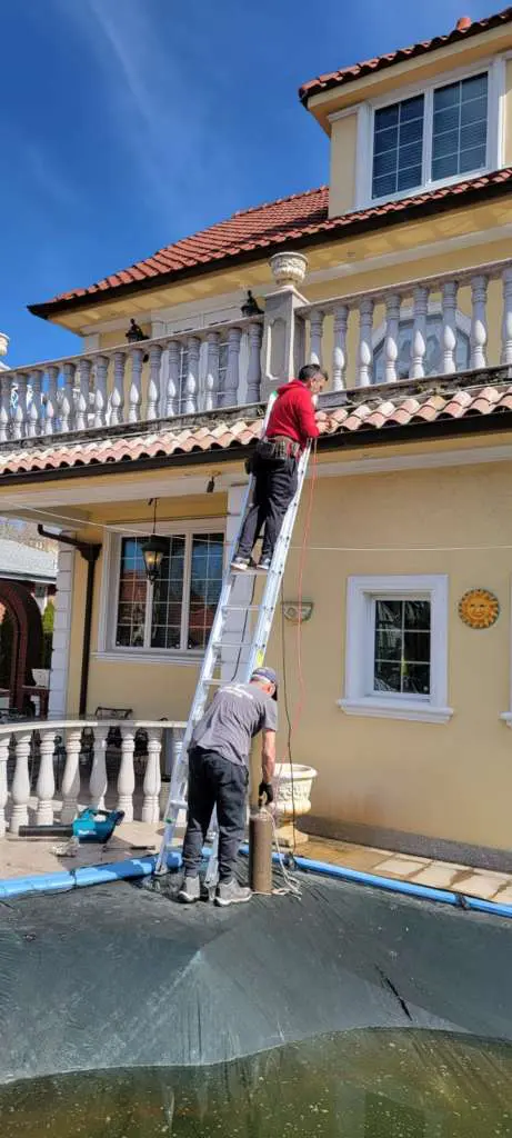 Gutter Repair and Spanish Tile Roofing Project Shot 1