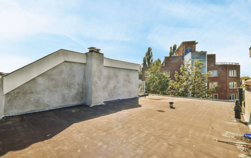 Flat Roof Replacement Costs from RH Renovation
