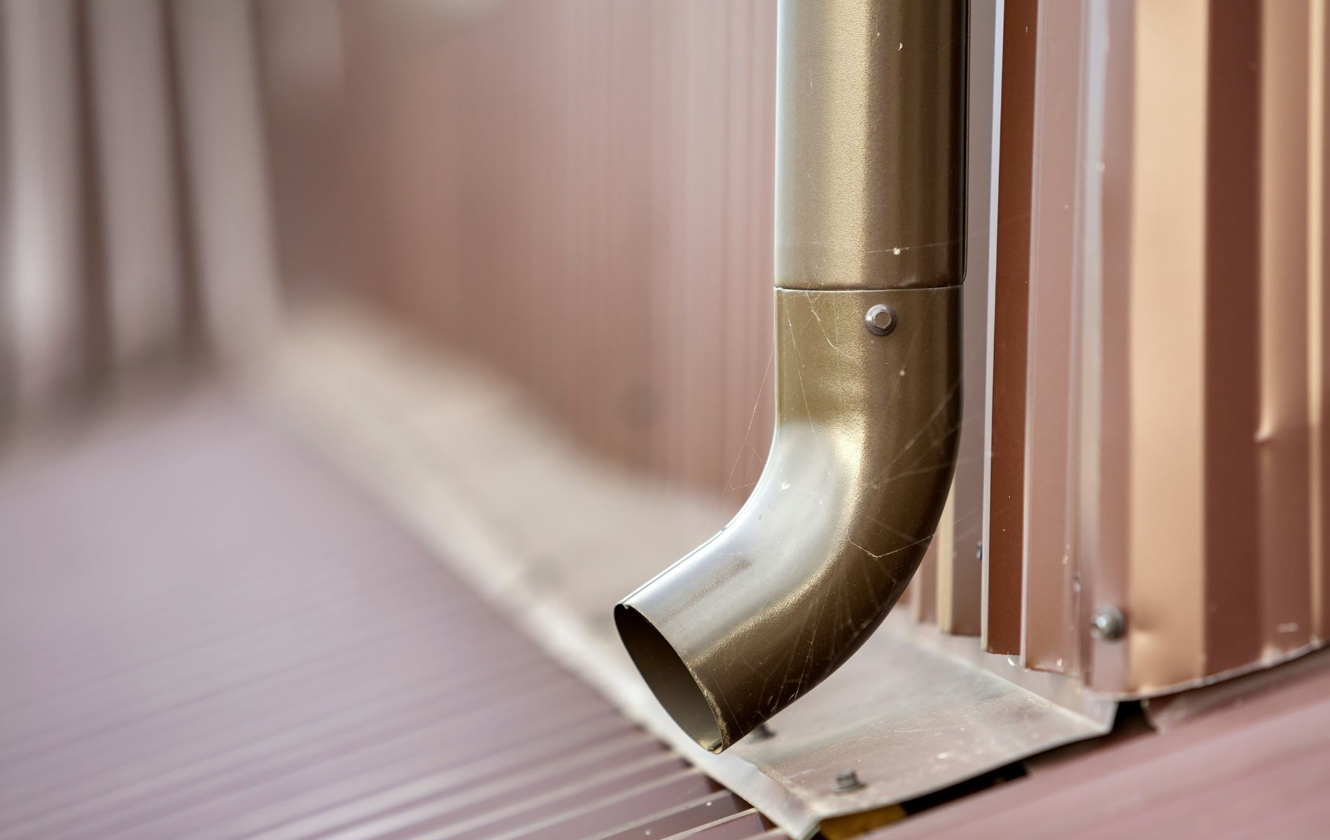 When to Request a Gutter Downspout Extension