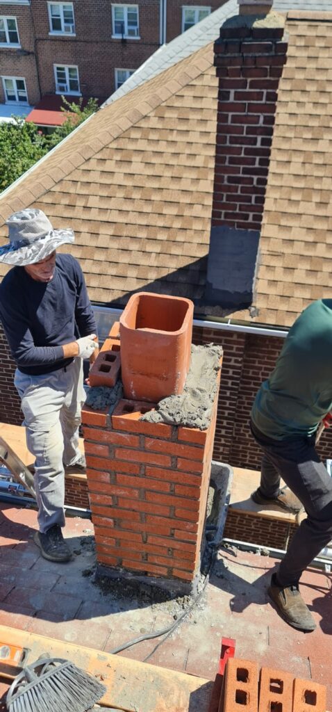 Existing Chimney Demolition and new Chimney Brick Installation Project Shot 1