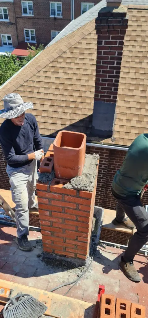 Existing Chimney Demolition and new Chimney Brick Installation Project Shot 1