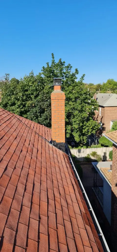 Existing Chimney Demolition and new Chimney Brick Installation Project Shot 2