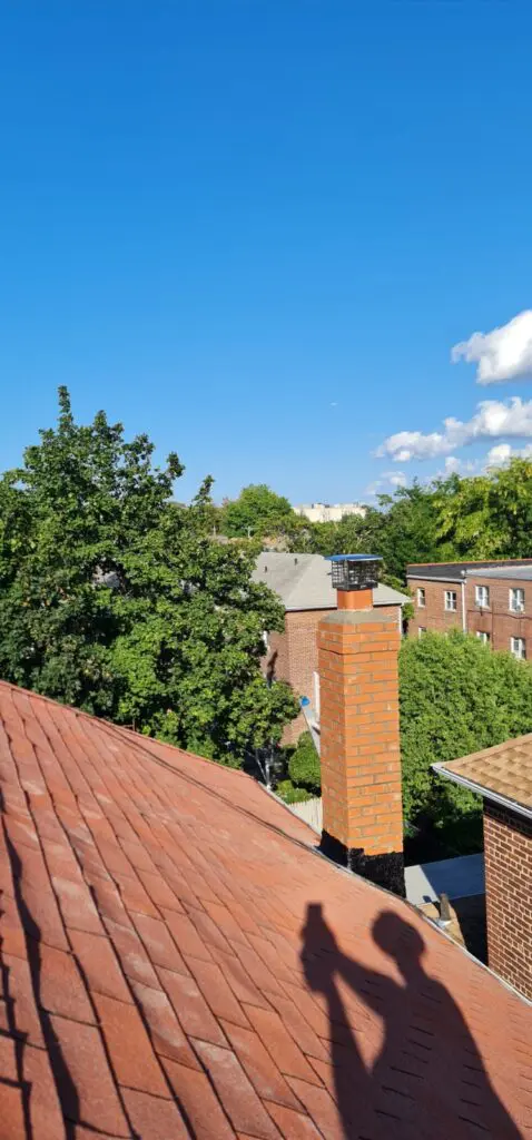Existing Chimney Demolition and new Chimney Brick Installation Project Shot 3