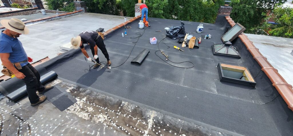 Existing Flat Roof Repair and Membrane Rubber Installation Project Shot 2
