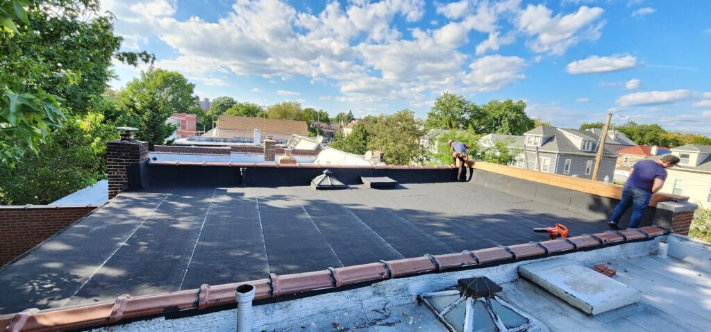 Existing Flat Roof Repair and Membrane Rubber Installation Project Shot 6