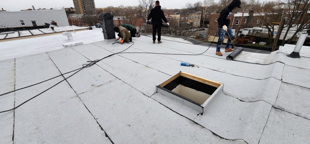 New Layer Installation Over Existing Flat Roof in Bronx Project Shot 4