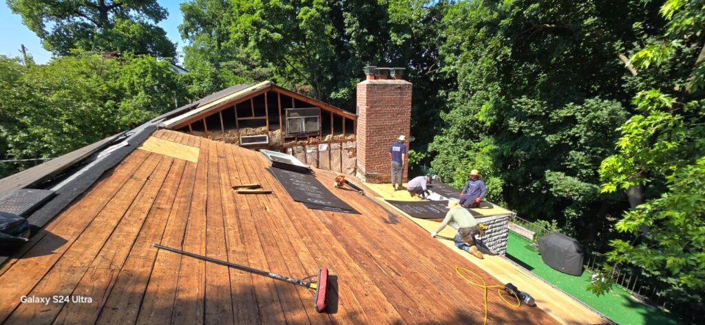 New Plywood on Shingle Flat Roof and Siding Installation Project Shot 2