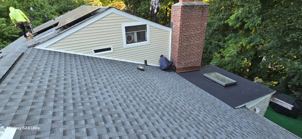 New Plywood on Shingle Flat Roof and Siding Installation Project Shot 9