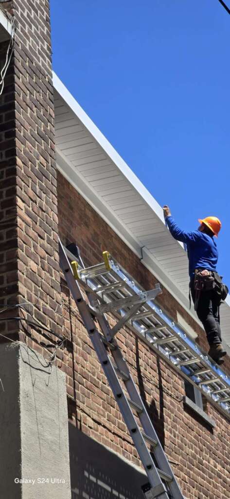 Plywood, Shingle Roof, Gutter & Soffit Installation in the Bronx NY Project Shot 4