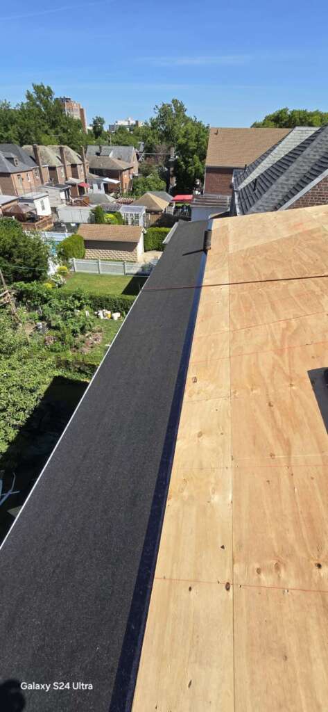 Plywood, Shingle Roof, Gutter & Soffit Installation in the Bronx NY Project Shot 5