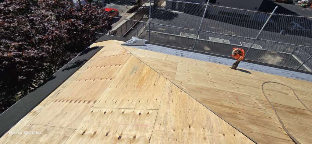 Plywood, Shingle Roof, Gutter & Soffit Installation in the Bronx NY Project Shot 7