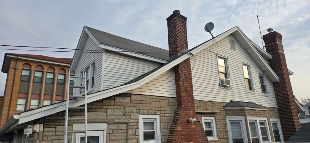 New Shingle Roof, Gutter, Siding and Soffit Installation in Bronx Project Shot 8