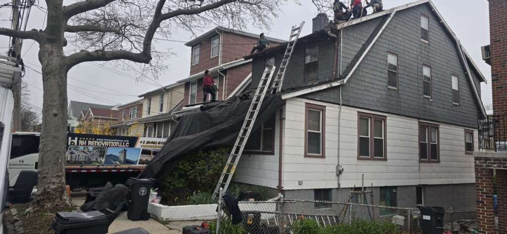 Shingle Roof, Gutter, Plywood and Chimney Installation in Bronx Project Shot 1