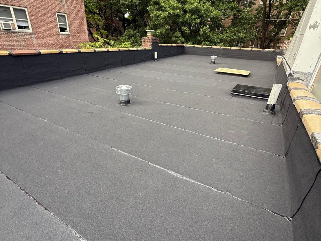 Flat Roof, Skylight & Gutter Replacement Pelham Bay Bronx NY Project Shot 1