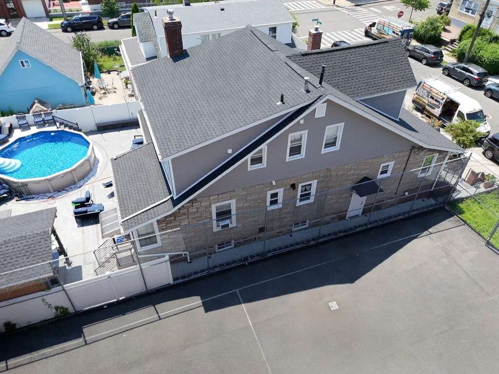 Project: Flat Shingle Roof, Siding & Gutter Replacement in Bronx