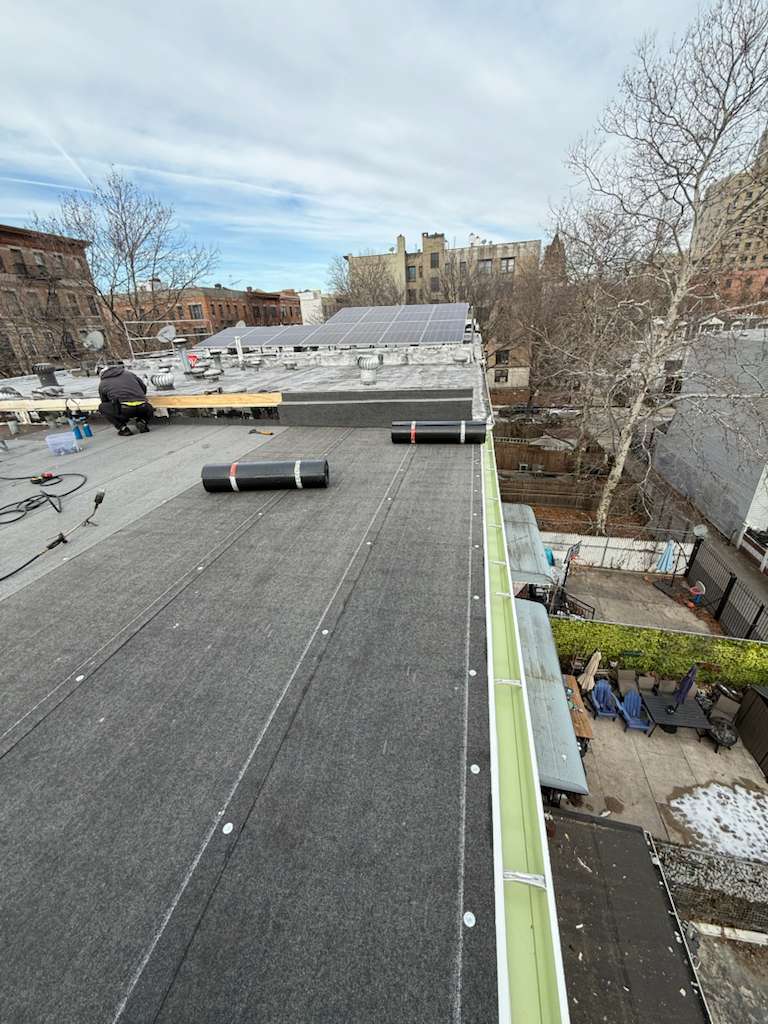 Flat roof replacement in bronx