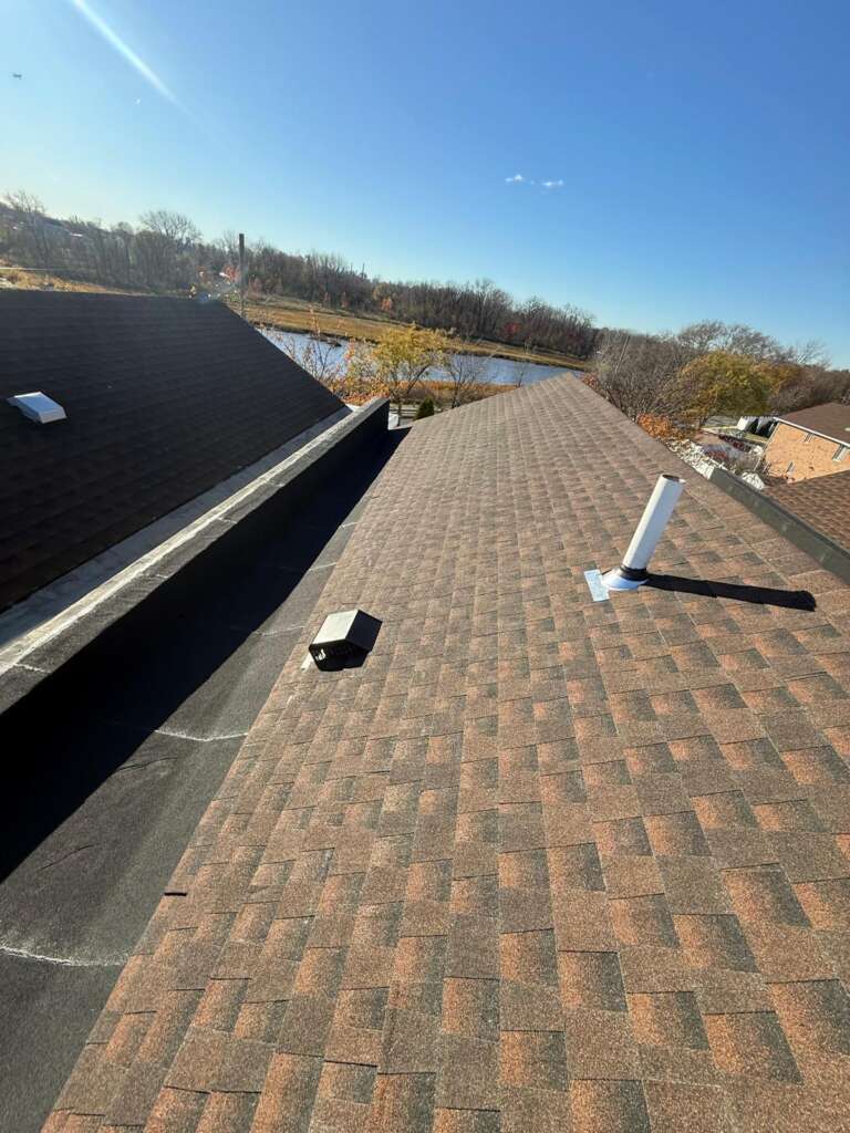 Completed new shingle roof installation at Castle Hill, Bronx (ZIP 10473). High-quality shingle roofing system installed by Home Team Construction for maximum durability and protection.