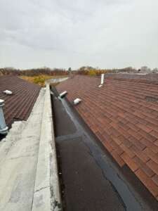Shingle roof installation in progress at Castle Hill, Bronx (ZIP 10473). Roofing team removing old shingles, preparing roof deck, installing underlayment and ventilation for durable and long-lasting results