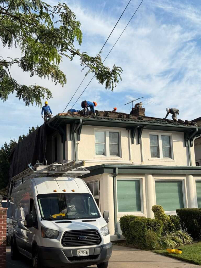 Spanish Tile Roof Replaced with New Shingle & Gutter Installation in Queens Project Shot 10